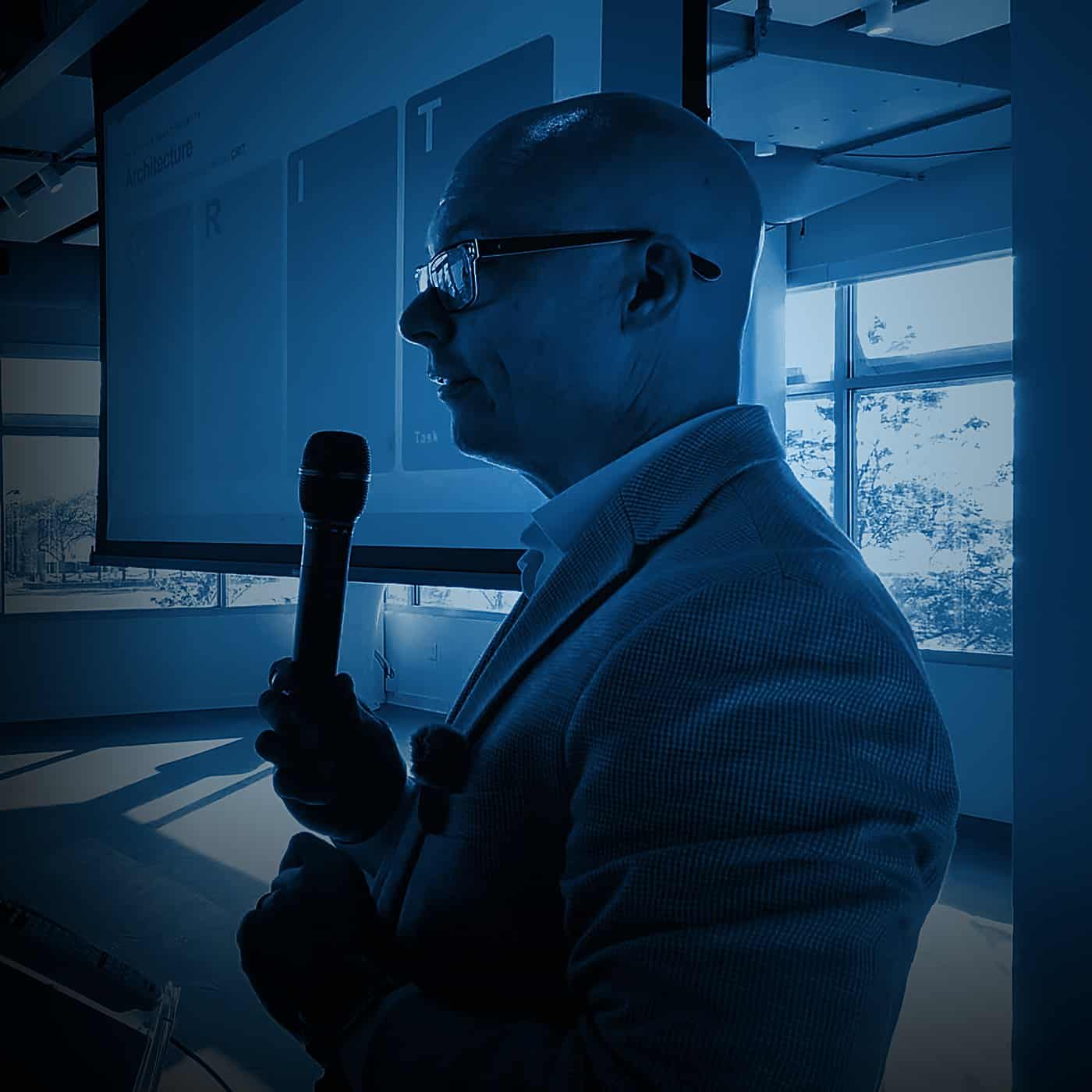 Chris Bernard presenting the CRIT framework at a live AI training session